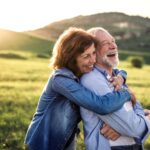 smiling senior couple, dental implants for seniors